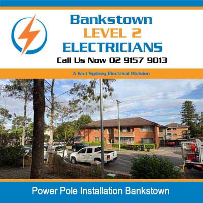 Power poles and overhead lines in residential apartment complex area in Bankstown